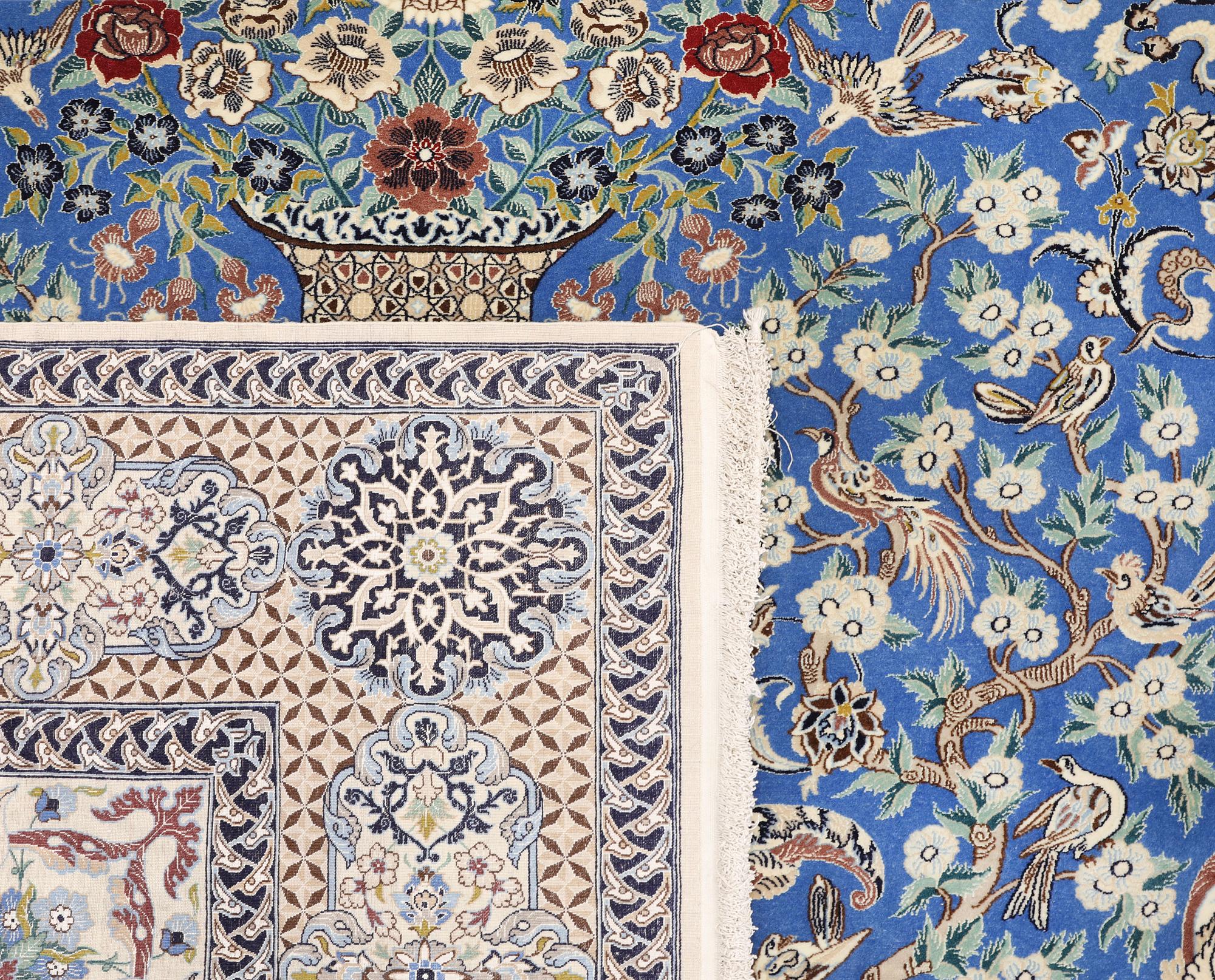 A Figural Nain-Isfahan carpet, part silk, 318 x 213 cm.