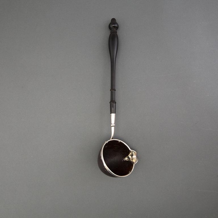 A silver and coconut rococo soup spoon, Sweden 18th century, marked LS.