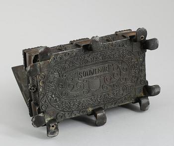 SKRIN, bronserad metall, 1800-talets andra hälft.