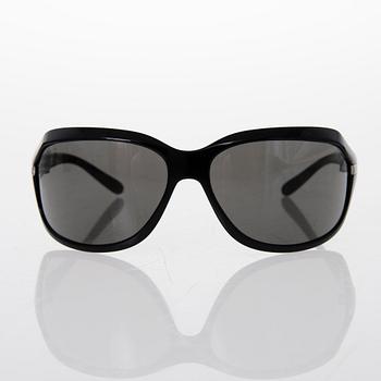 Prada and Chanel Sunglasses.