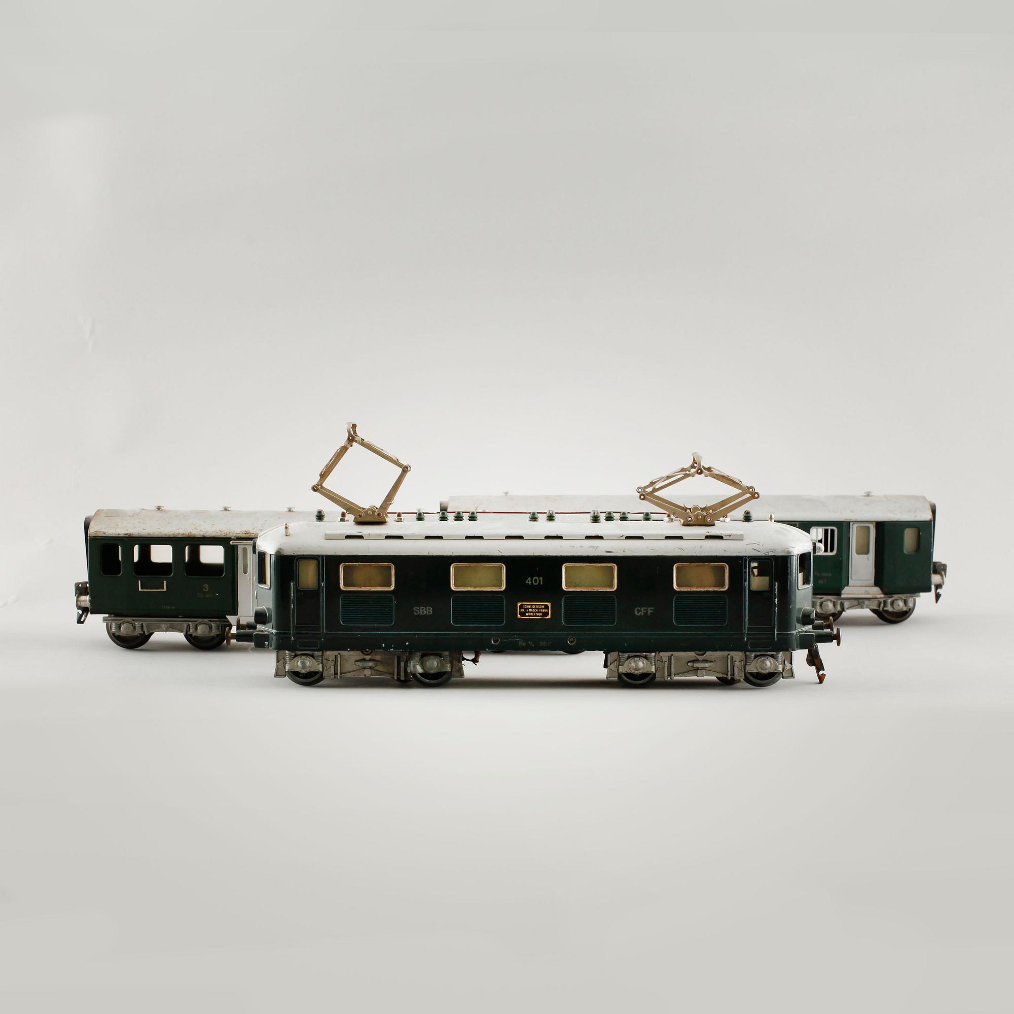 A 1940/50s model train set of 31 pcs in O-scale made by HAG, Switzerland.