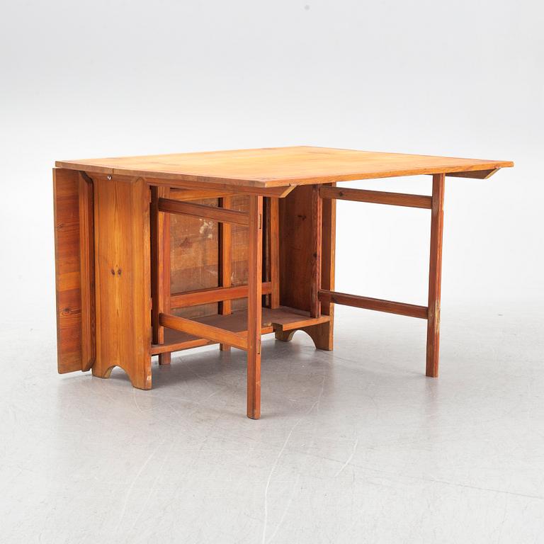 A gate-leg table, around 1900.