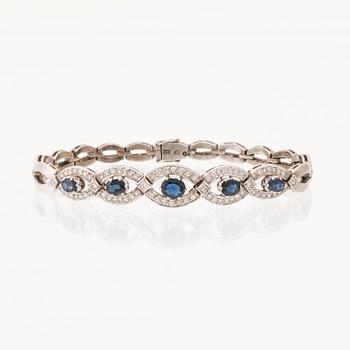 An 18K white gold bracelet set with oval faceted sapphires and brilliant-cut diamonds, Stockholm.