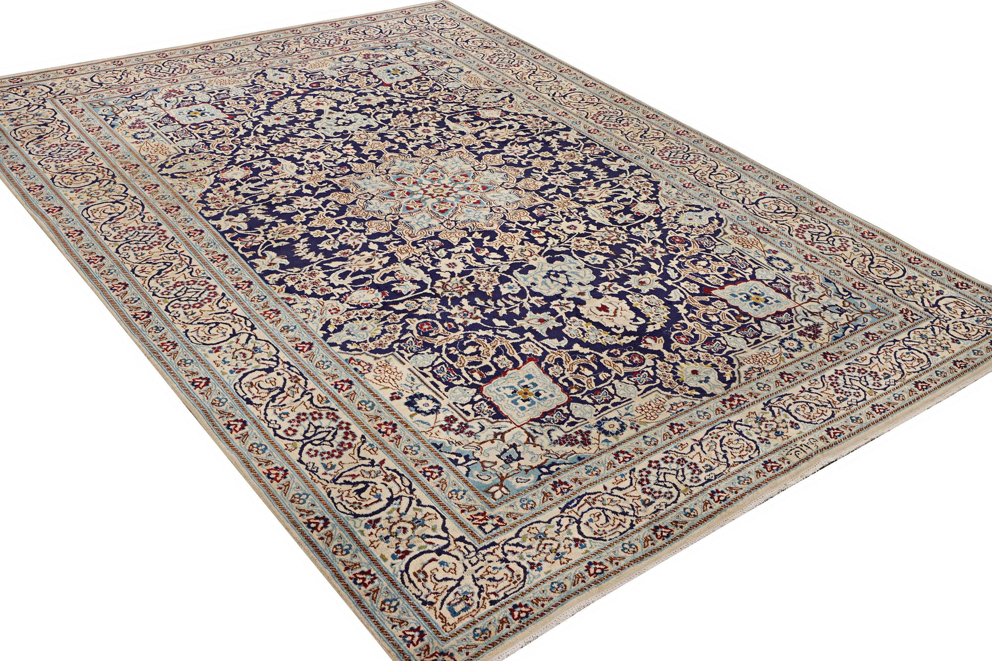 A Nain carpet, part silk, c. 338 x 244 cm.