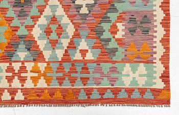 A kilim carpet, c. 295 x 203.