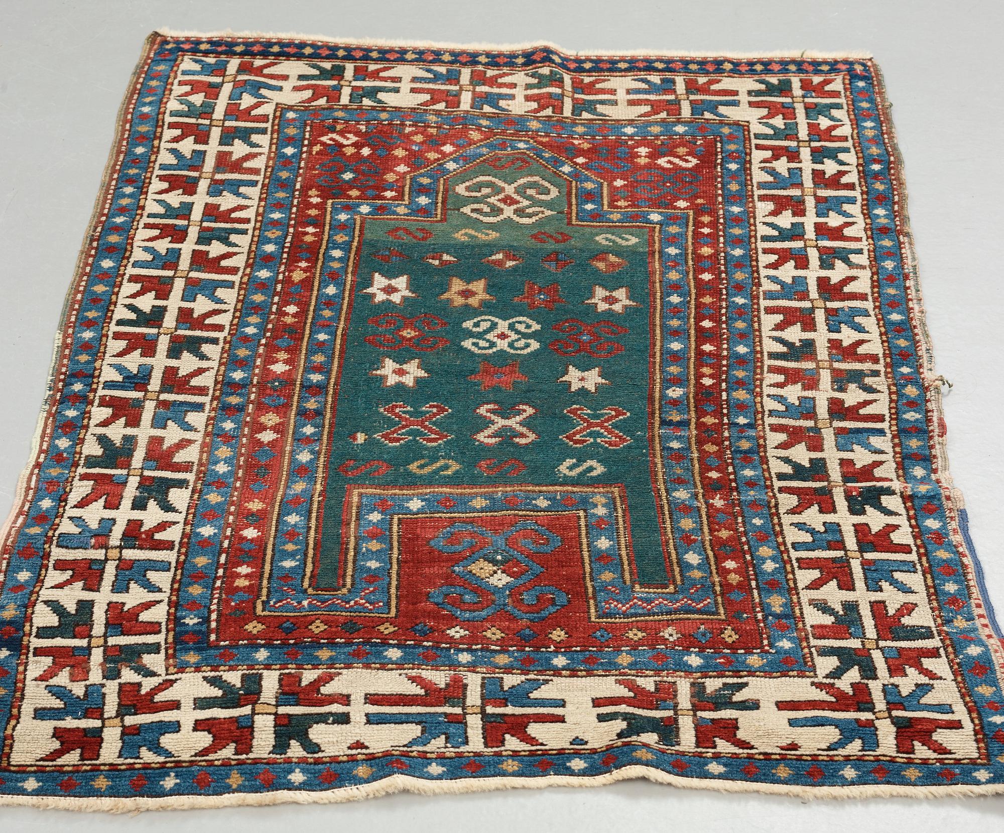 A RUG, an antique Fachralo Kazak, ca 149 x 104,5 cm.
