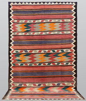 A Nomad Kilim carpet, approx. 375 x 195 cm.