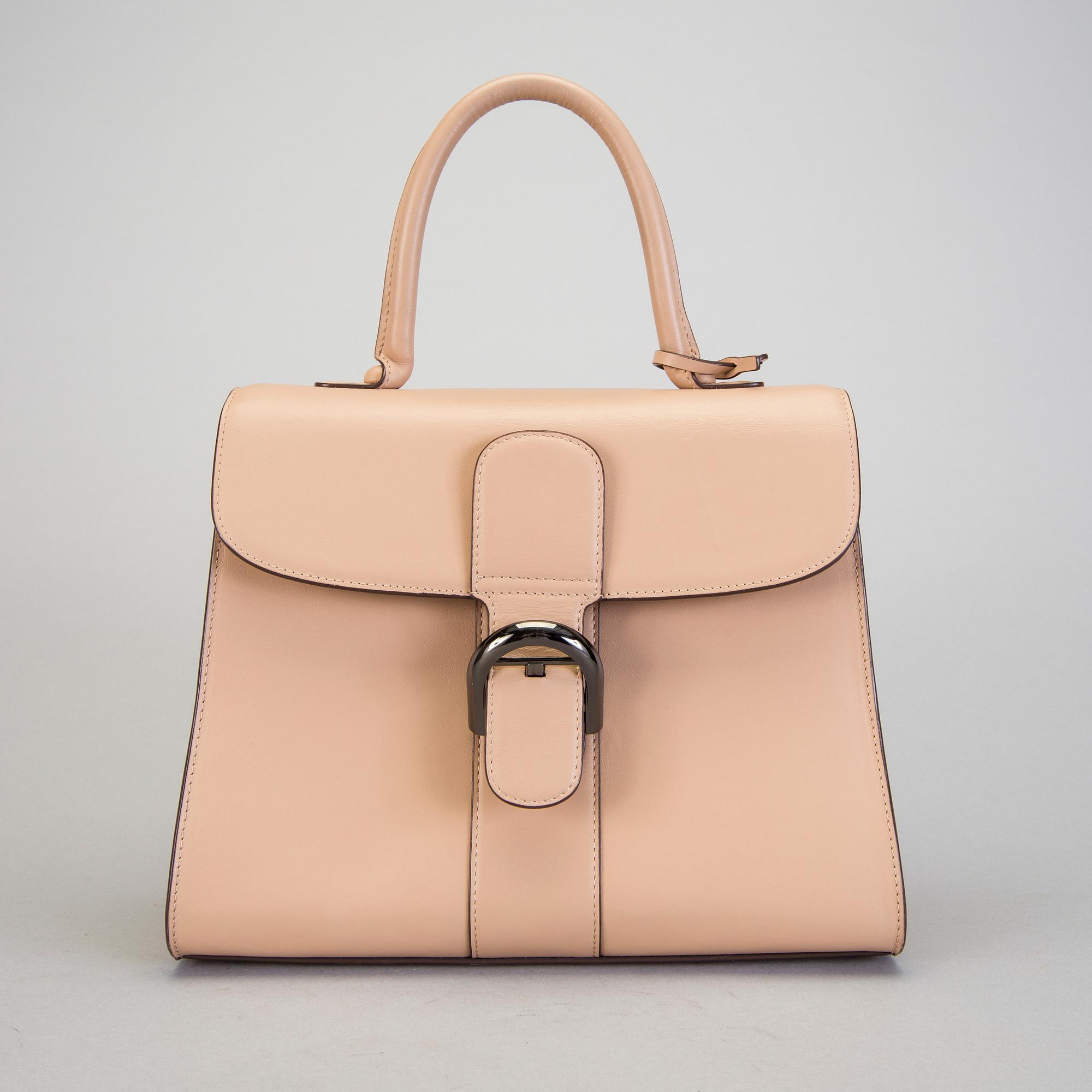 A Delvaux "Brillant" ladies handbag in nude/biscuit colored leather.