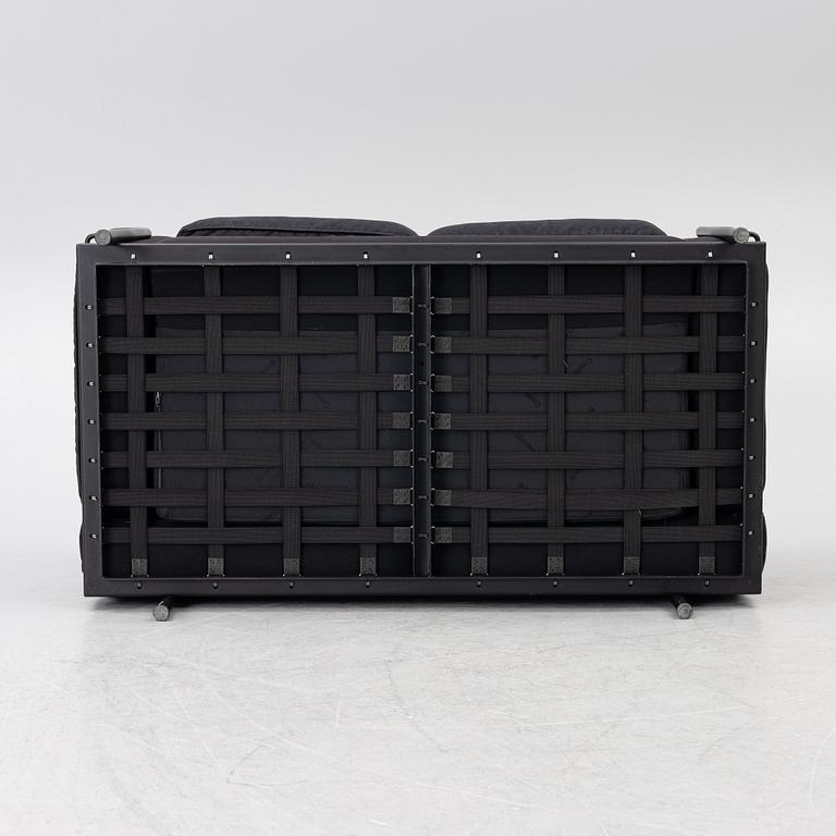 Pierre Jeanneret, Charlotte Perriand & Le Corbusier, an 'LC 2' sofa, Cassina, Italy.