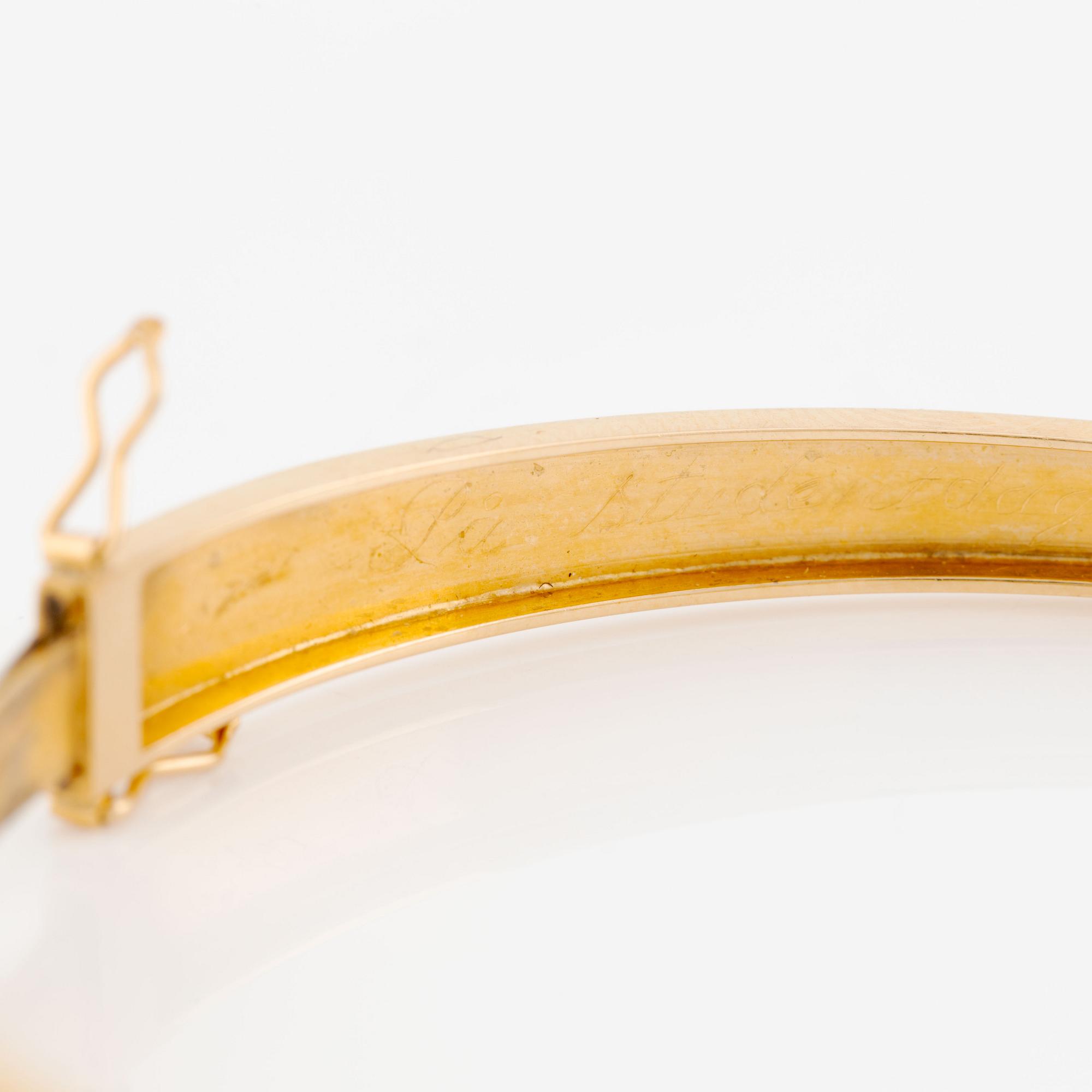 Bangle, 18K gold with pearls and small octagon-cut diamonds.