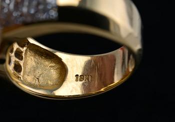 SORMUS, prinsesshiottuja timantteja n. 2.56 ct. Tansaniitti n. 3.8 ct. 18K kultaa. Paino 11 g.