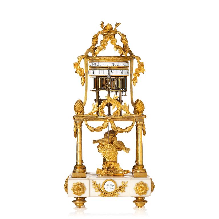 A Louis XVI marble and ormolu 'aux cercles tournants' portico mantel clock, late 18th century.