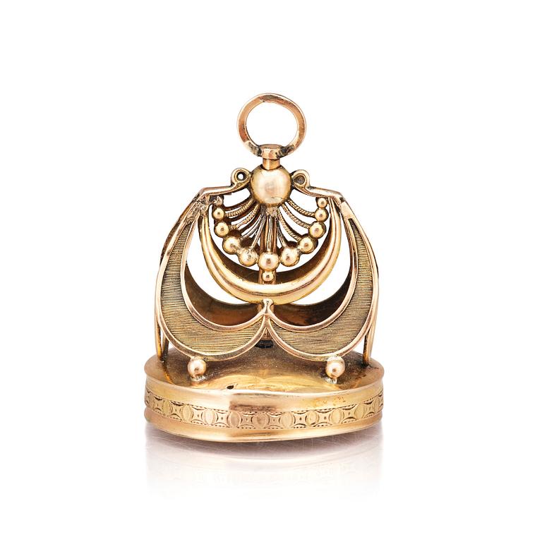 A gold musical fob seal. 19th Century.