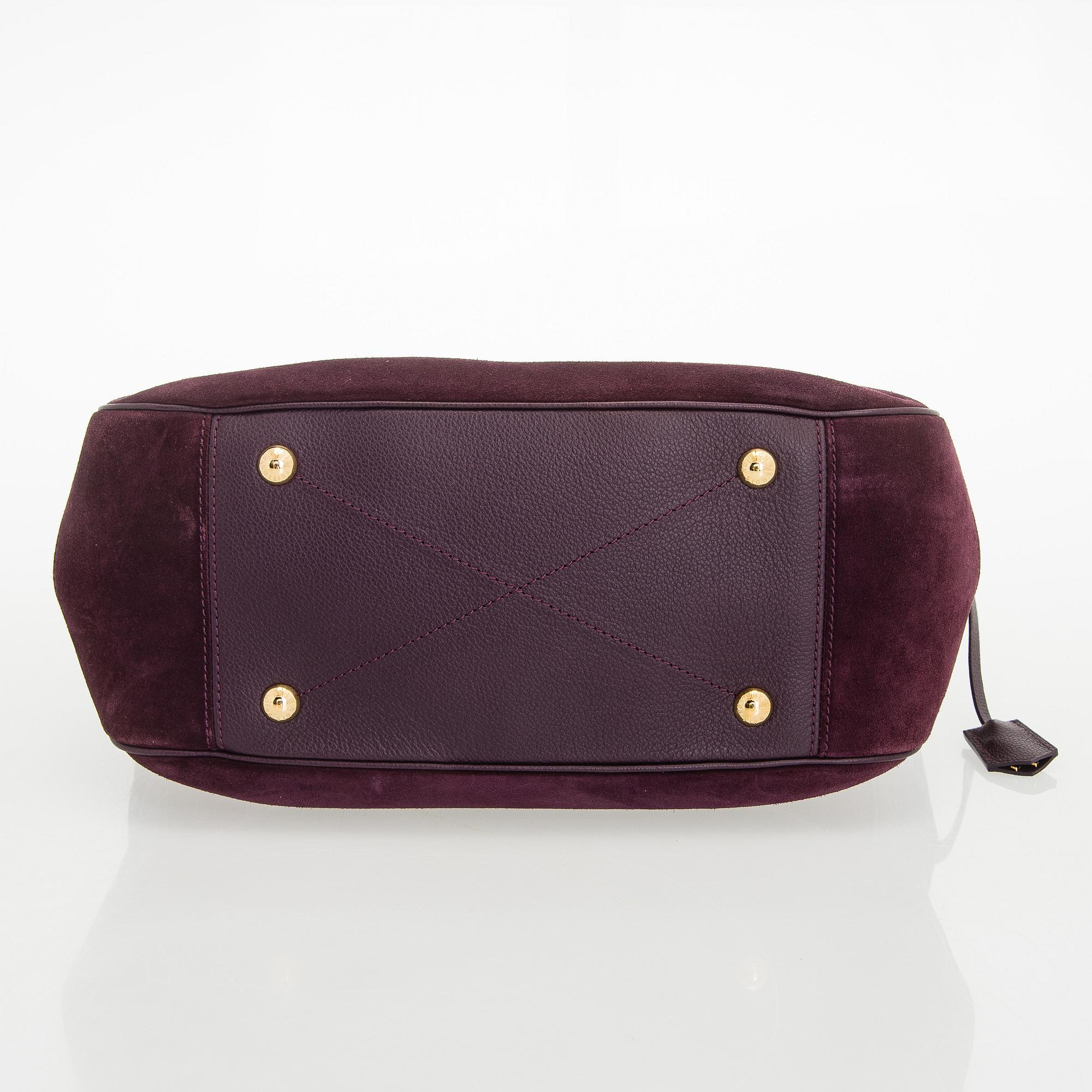 Louis Vuitton, a Monogram Empreinte 'Audacieuse' bag.