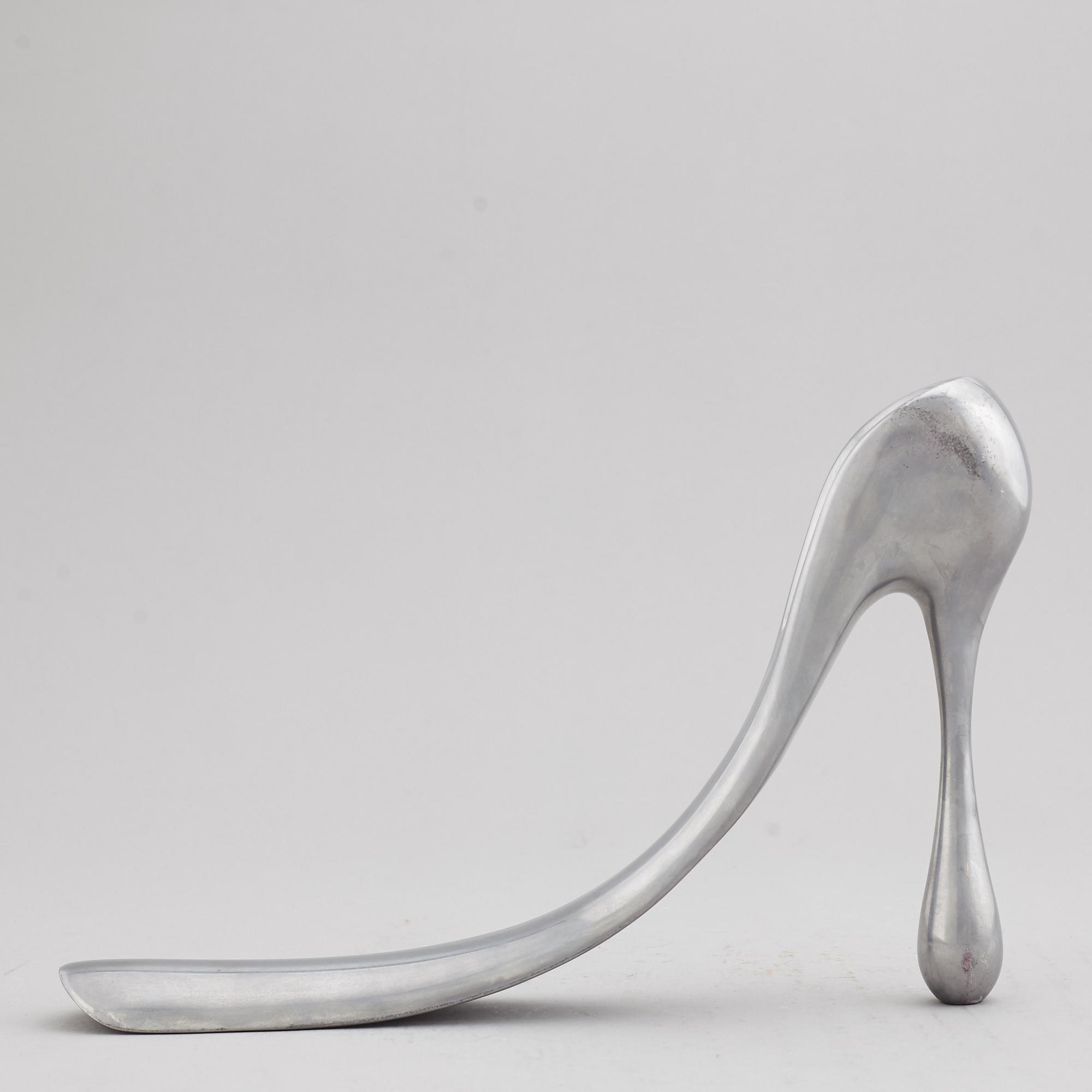 A Manolo Blahnik shoe horn, modern.