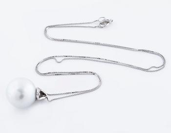 A cultured pearl and ca 0.15 cts brilliant cut diamond pendant.