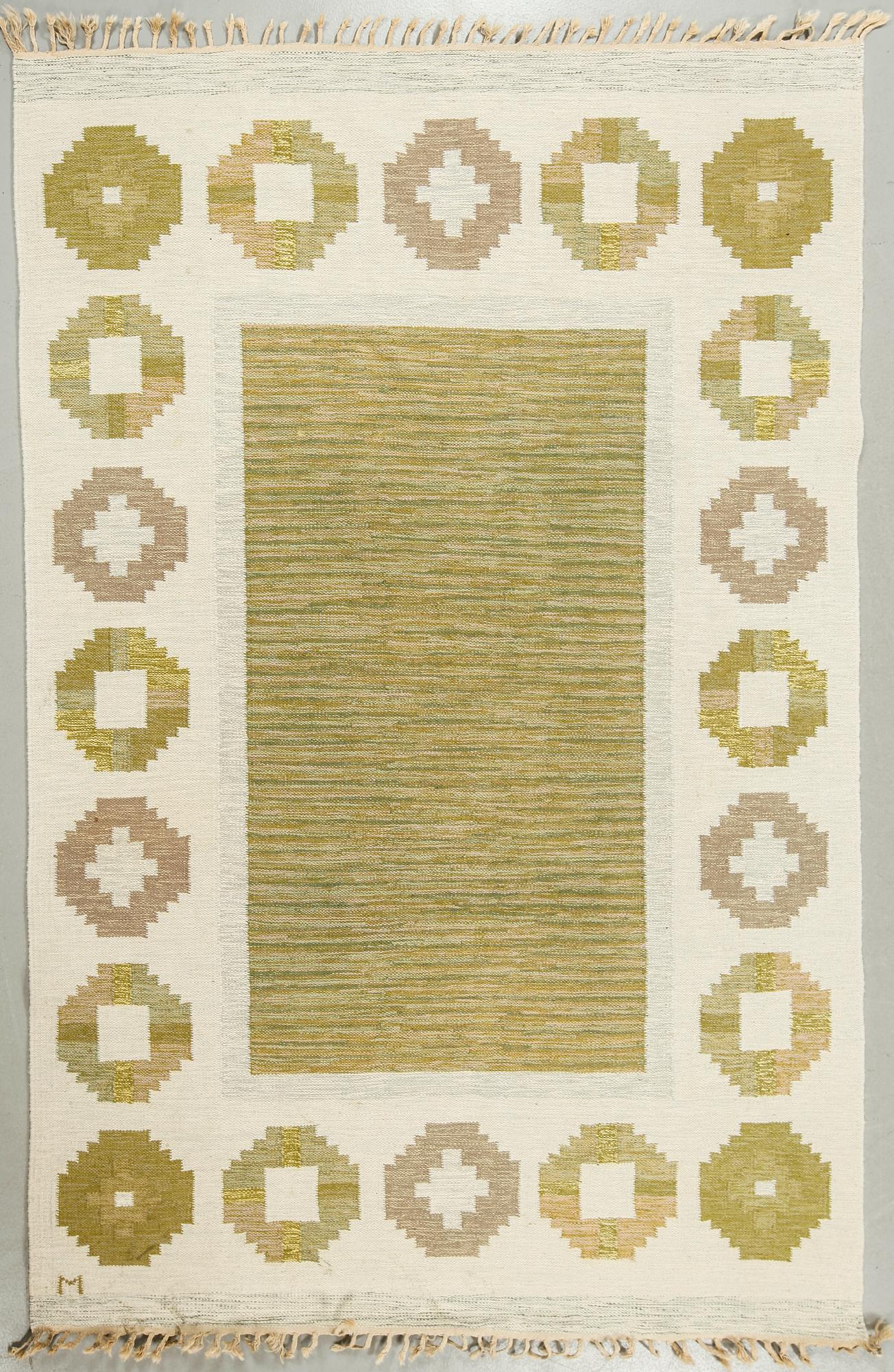 A flat weave carpet signed M from the second half of the 20th century.