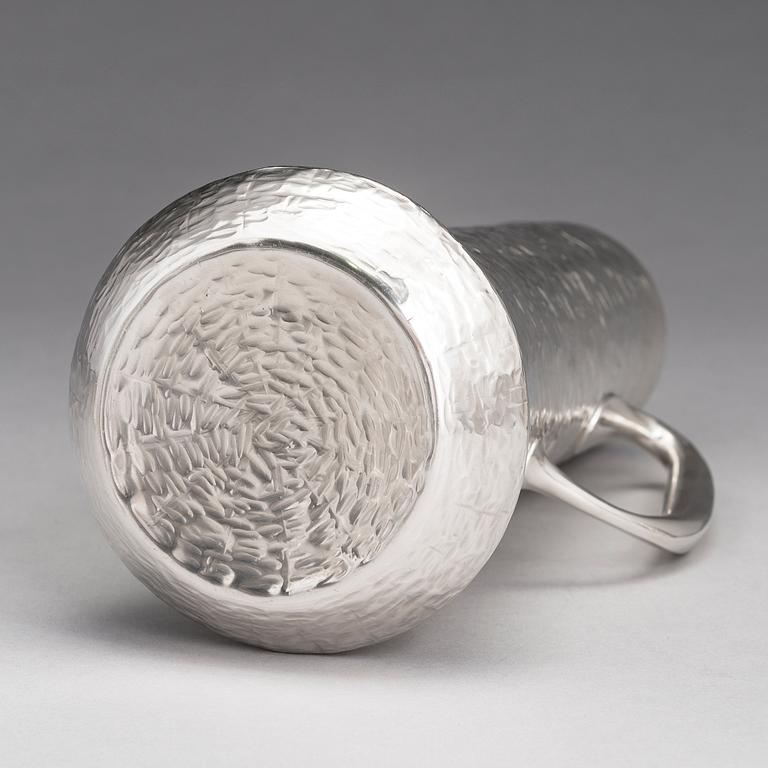 TAPIO WIRKKALA, A silver pitcher with four silver beakers, marked TW, Kultakeskus oy, Hämeenlinna Finland 1973 and 1977.