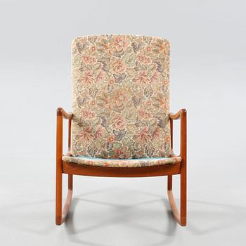 A rocking chair by Ole Wanscher for France & son from Denmark from the second part of the 20th century.