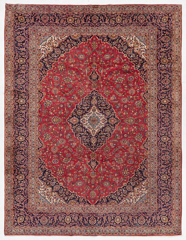 A Keshan carpet, central Iran, signed c, 392 x 301 cm.