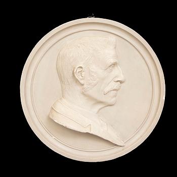 A plaster medallion dated 1893.