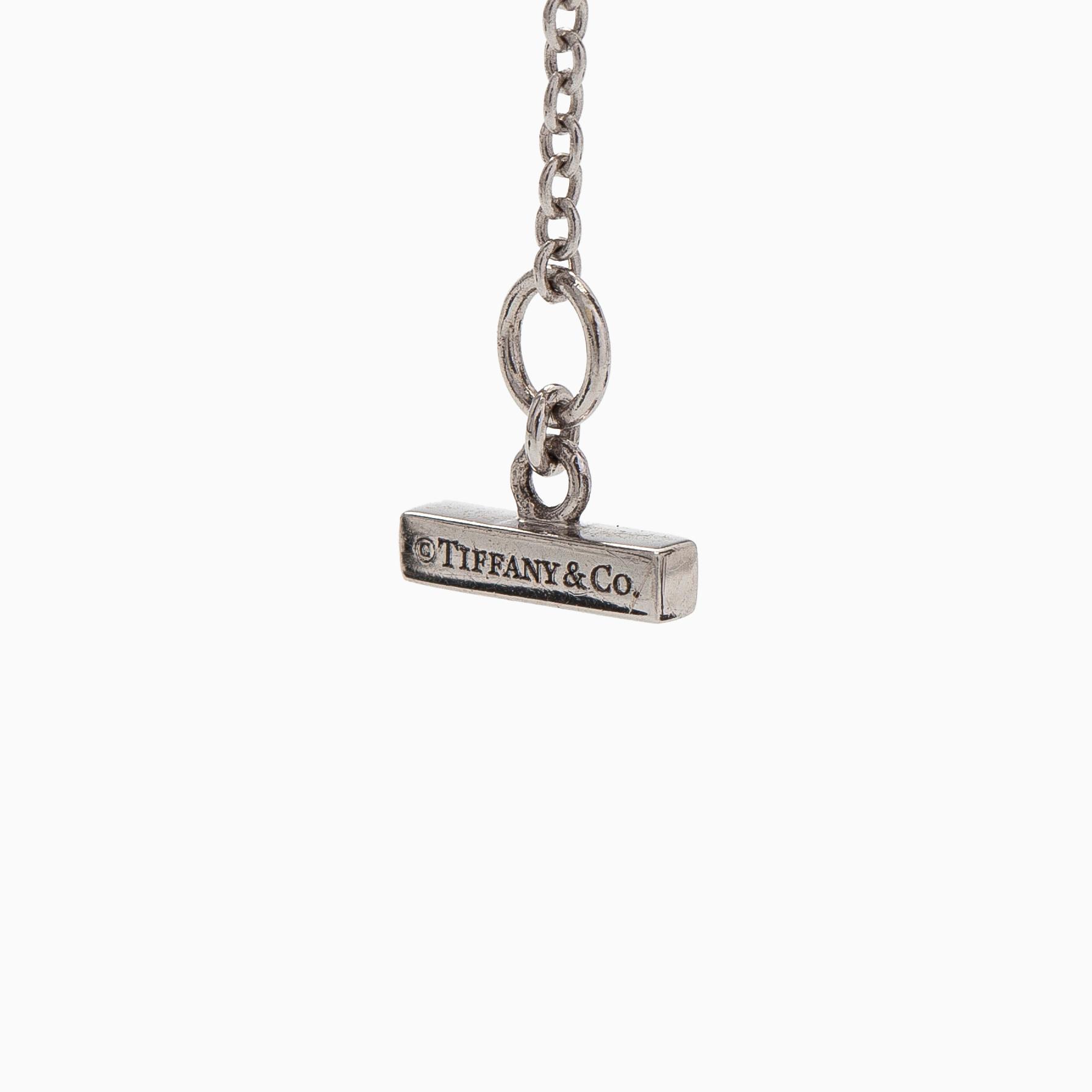 Tiffany & Co, kaulakoru, "T Two Circle", 18K valkokultaa ja turkoosi.