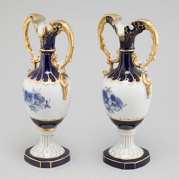 A pair of porcelian vases by Royal Dux, from the latter half of the 20th century.