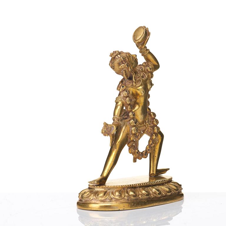 A gilt bronze figure of Dakini, Tibeto-Chinese, 19th Century.
