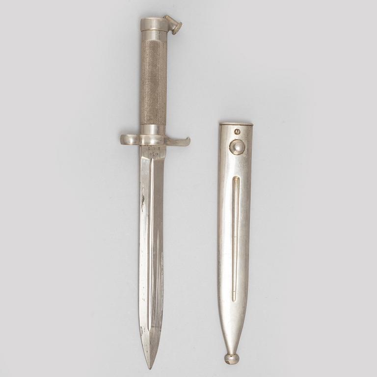 A hunting sword and two bayonets with scabbards.