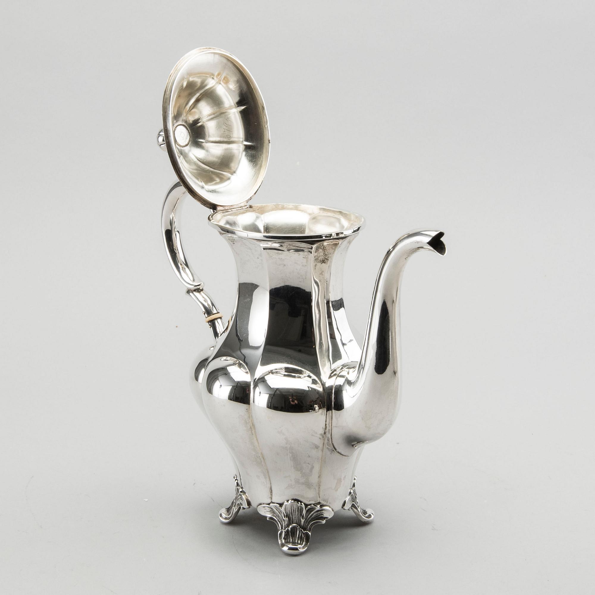 A three piece silver coffee service byGAB AB 1932-33, 1330g.