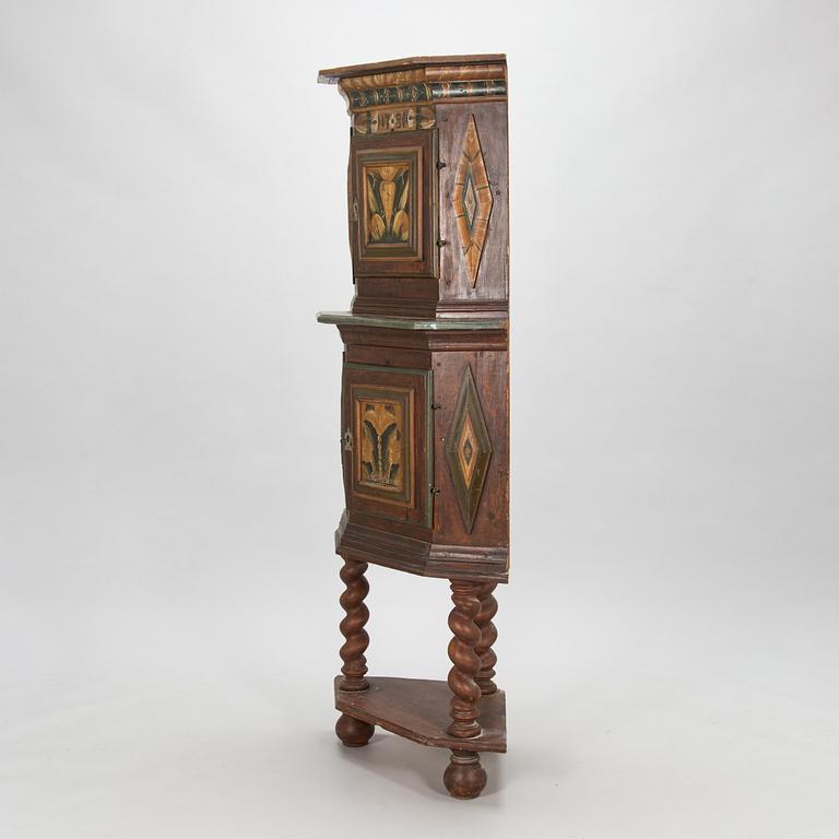 A Swedish corner cabinet from Dalarna dated 1734.