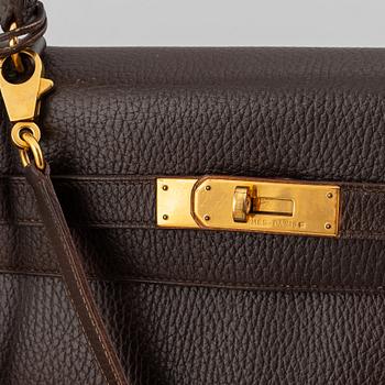Hermès, a chocolate leather 'Kelly' handbag, 1995.