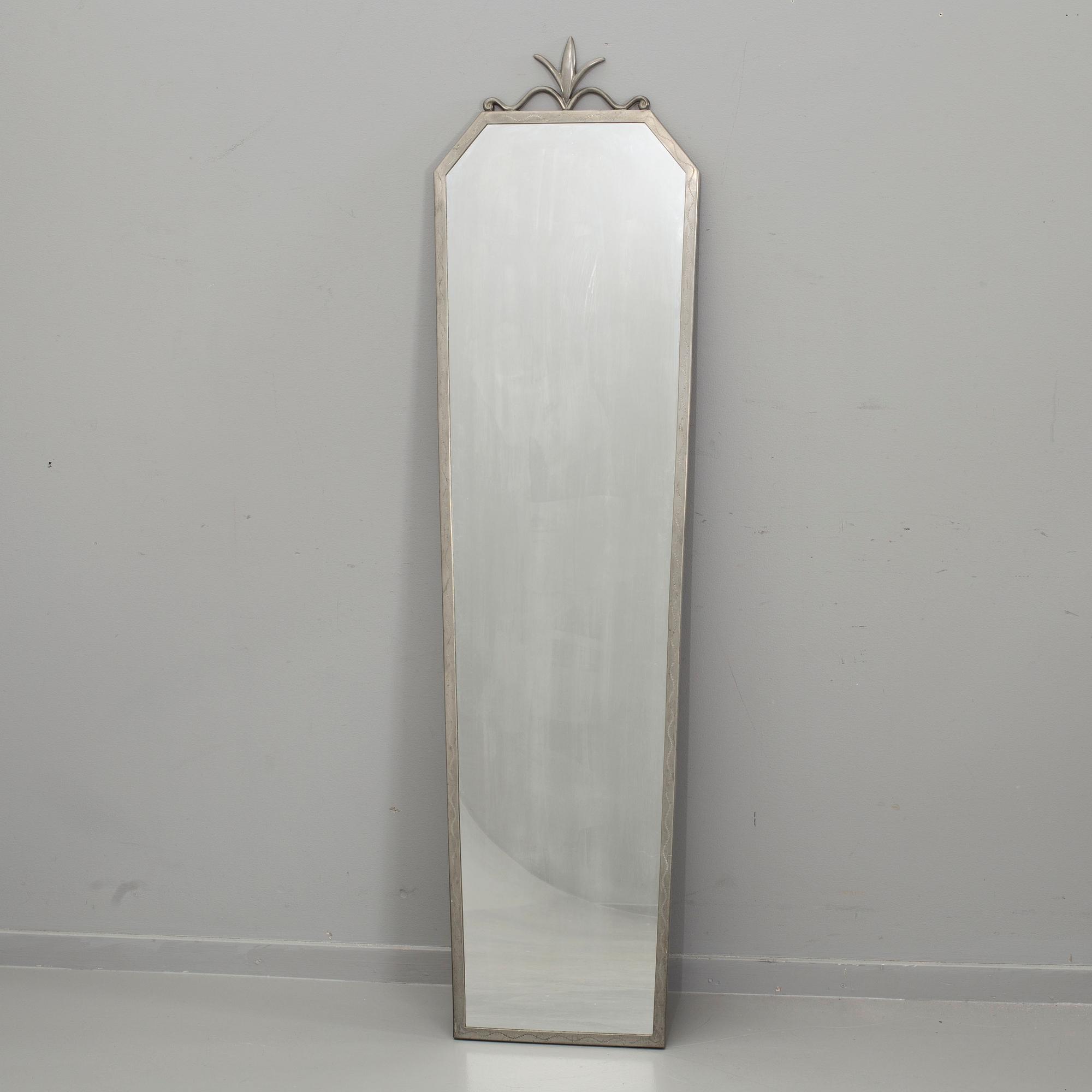 A PEWTER MIRROR, MID 20th CENTURY.