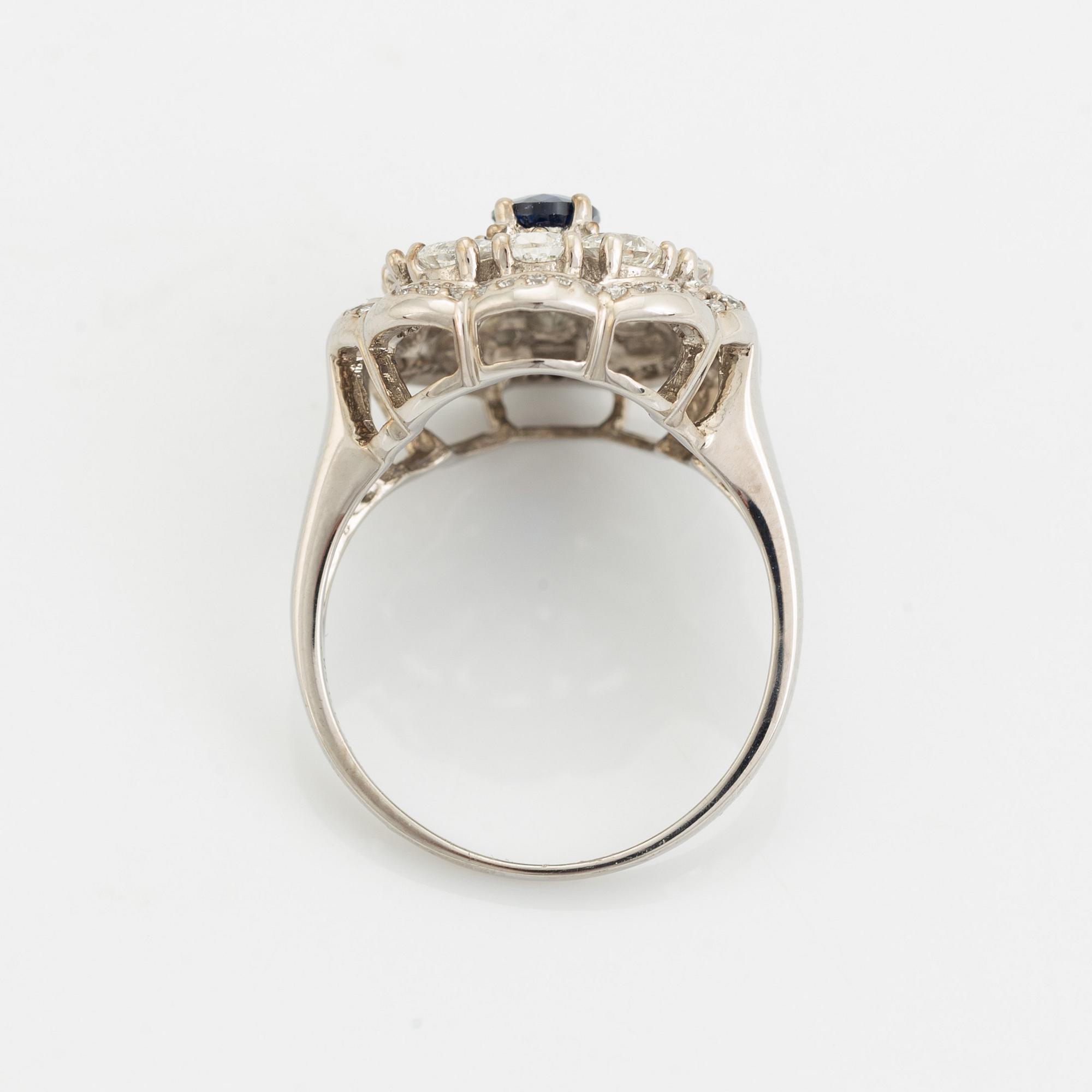Sapphire and pear and brilliant cut diamond ring.