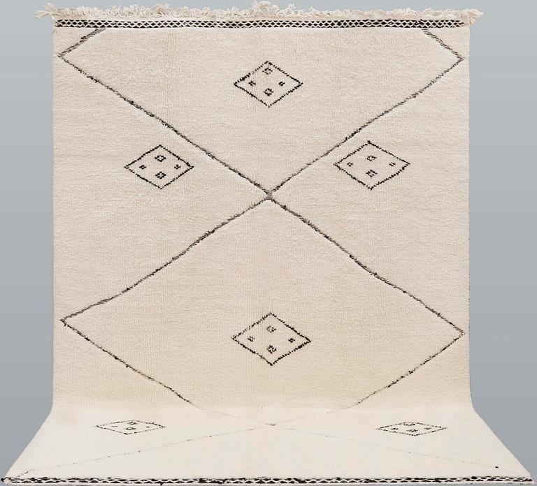 A moroccan carpet, ca 300 x 200 cm.