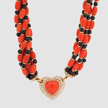 A 6-strand carved coral, onyx beads and gold rondelles necklace.