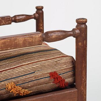 Axel Einar Hjorth, a pair of stained pine "Sandhamn" easy chairs, Nordiska Kompaniet, Sweden, 1929.