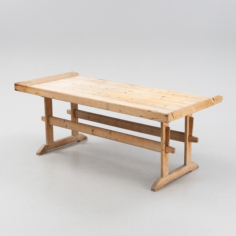 A pine baking table, 19th Century.