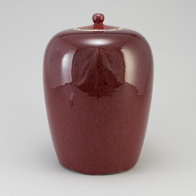 A stoneware lidded urn China 20th century.