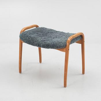 Yngve Ekström, a "Lamino" armchair with ottoman, Swedese, Sweden.