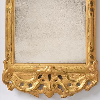 A rococo giltwood mirror by N. Meunier (master i Stockholm 1754-97).