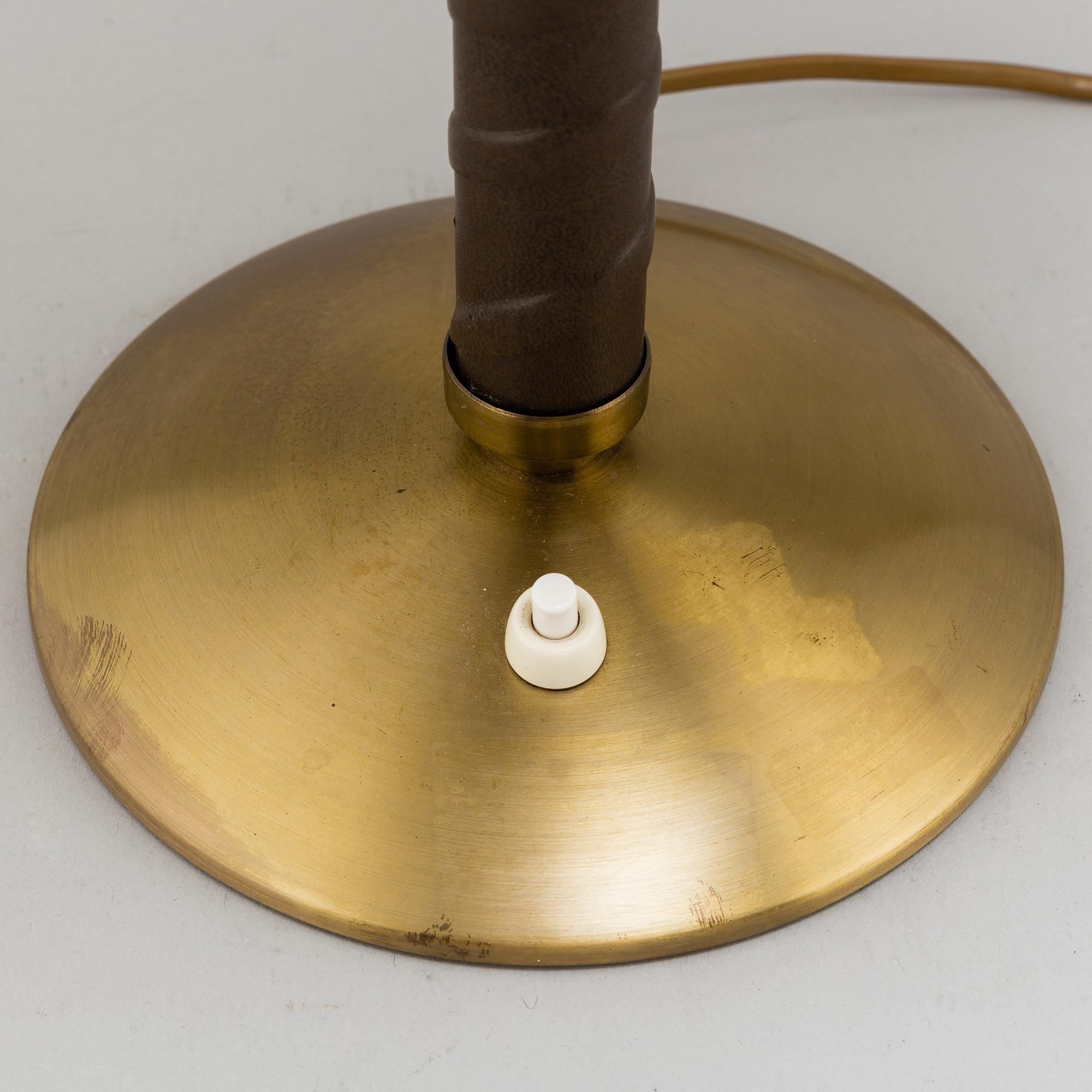 EINAR BÄCKSTRÖM, a brass modell 5013 table lamp.
