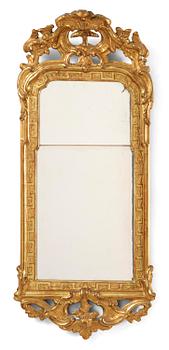 100. A giltwood rococo mirror, Stockholm, later part 18th century.