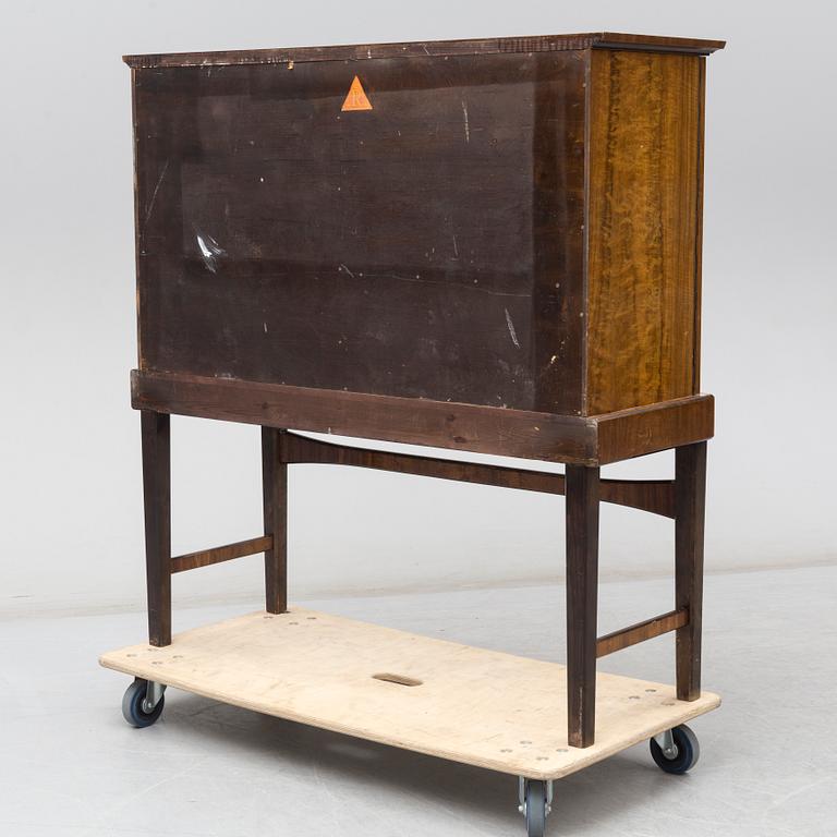 a 1930's Swedish Modern 'Tahiti' intarsia cabinet from Reiners Mjölby, Sweden.