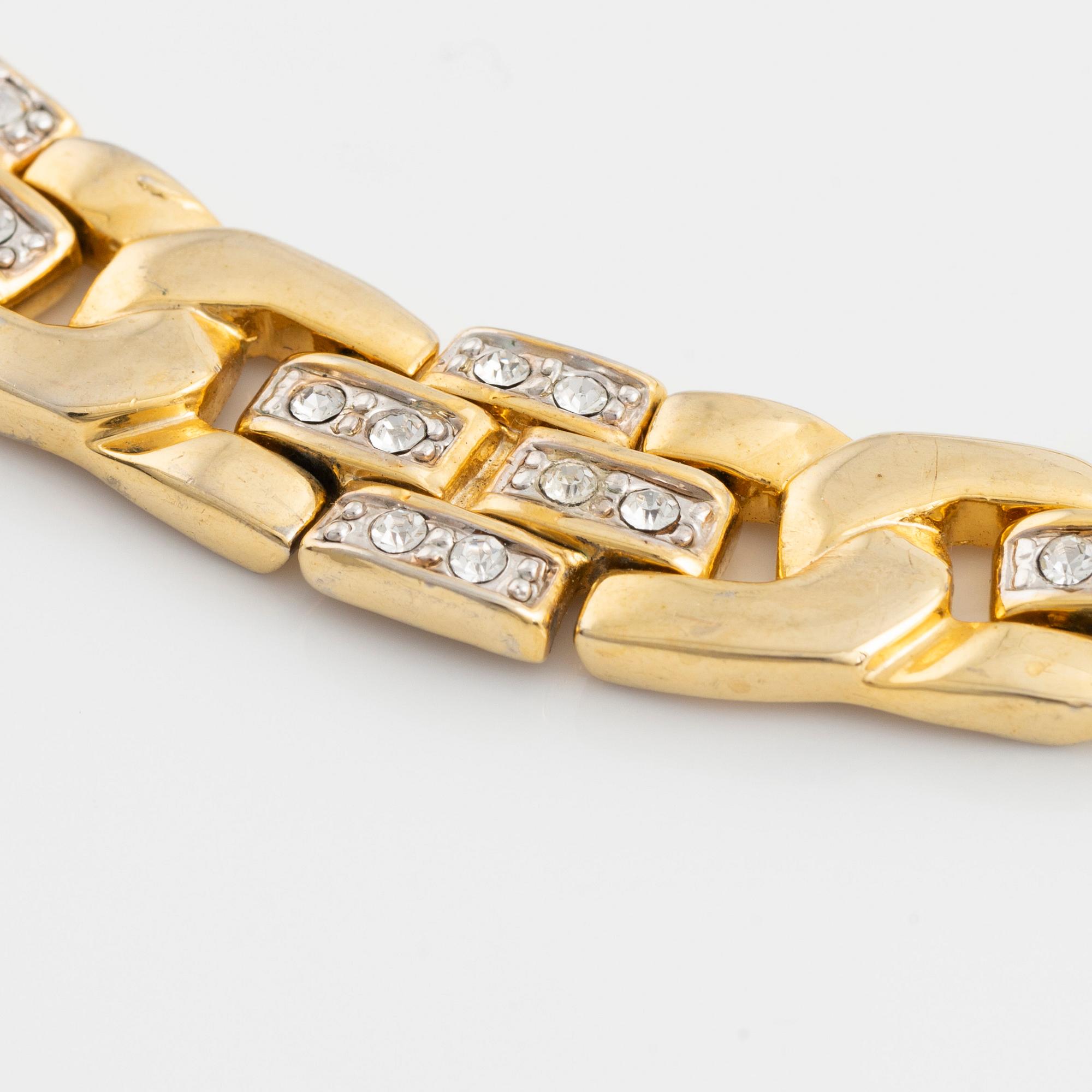 Oscar de la Renta bracelet, yellow metal with strass.