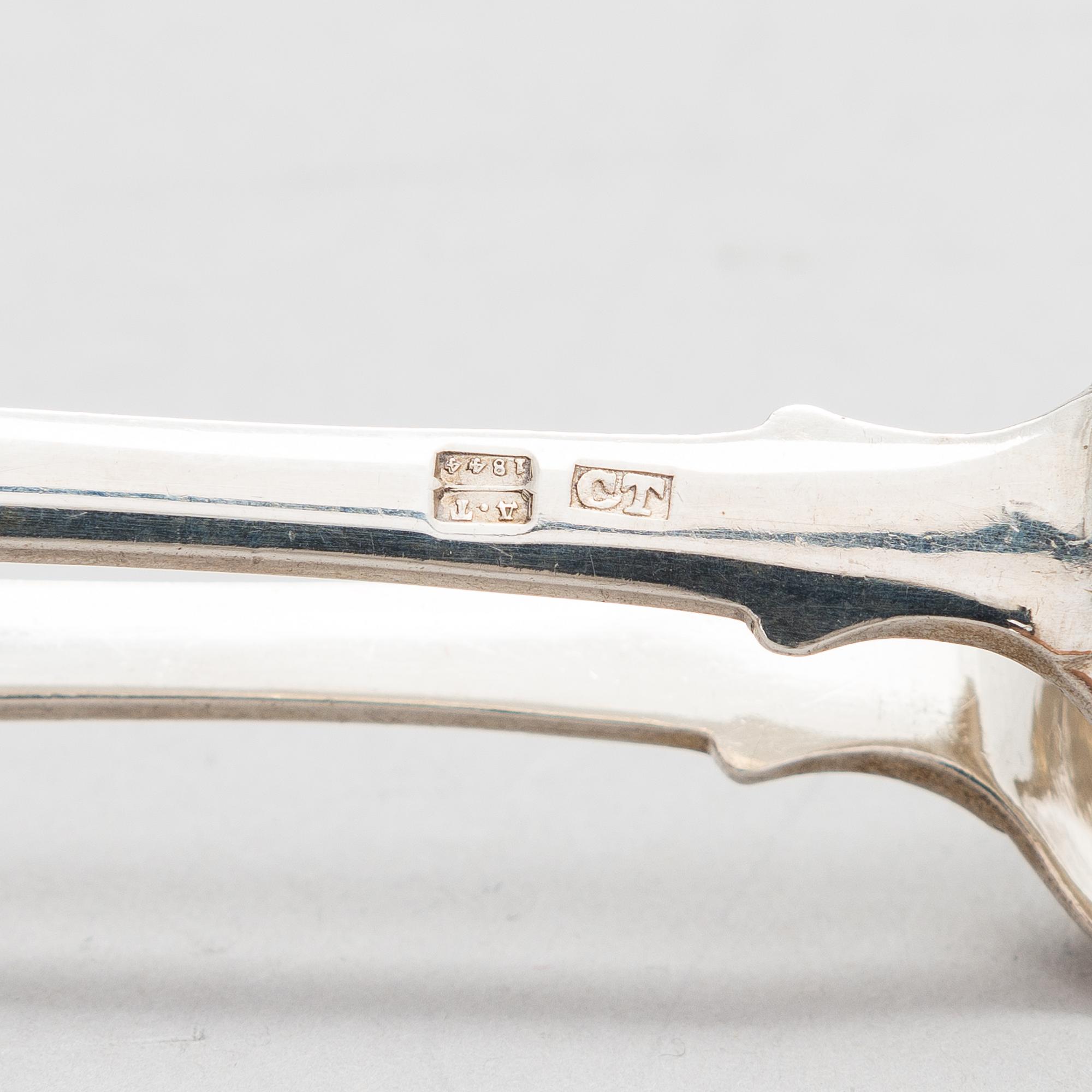 A Russian silver sugar tong, mark of Carl Johann Tegelsten, Saint Petersburg, 1844.