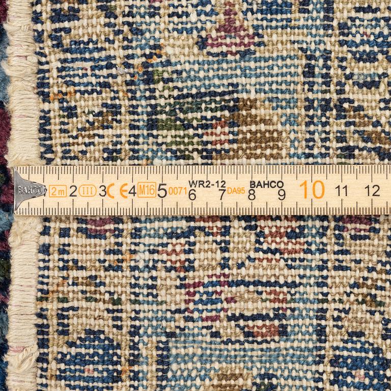 An antique rug, north-west Persian, so-called Vaghire, approx. 136 x 134 cm.