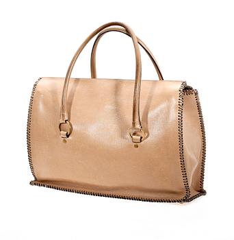 A 21th cent beige leather handbag by Gucci.