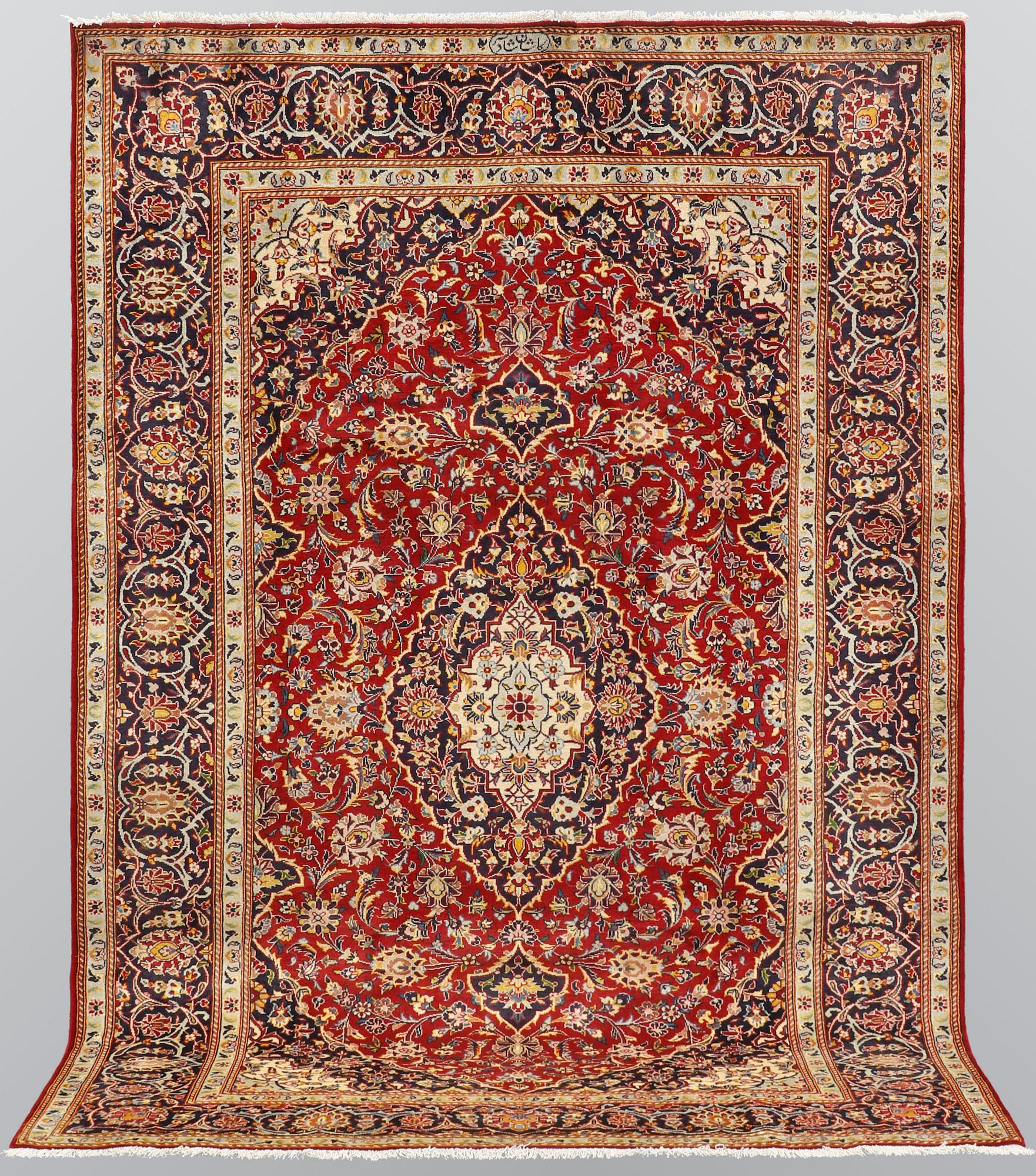 A carpet, Kashan, signed, ca 300 x 204 cm.