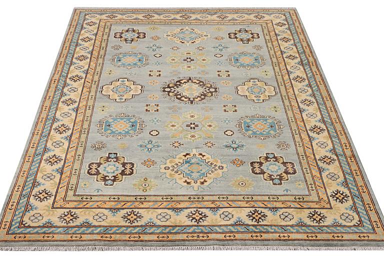 A Kazak carpet, c. 295 x 206 cm.